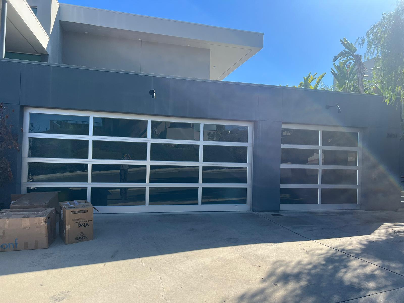 Luxury full-glass aluminum garage doors installed in Long Beach CA